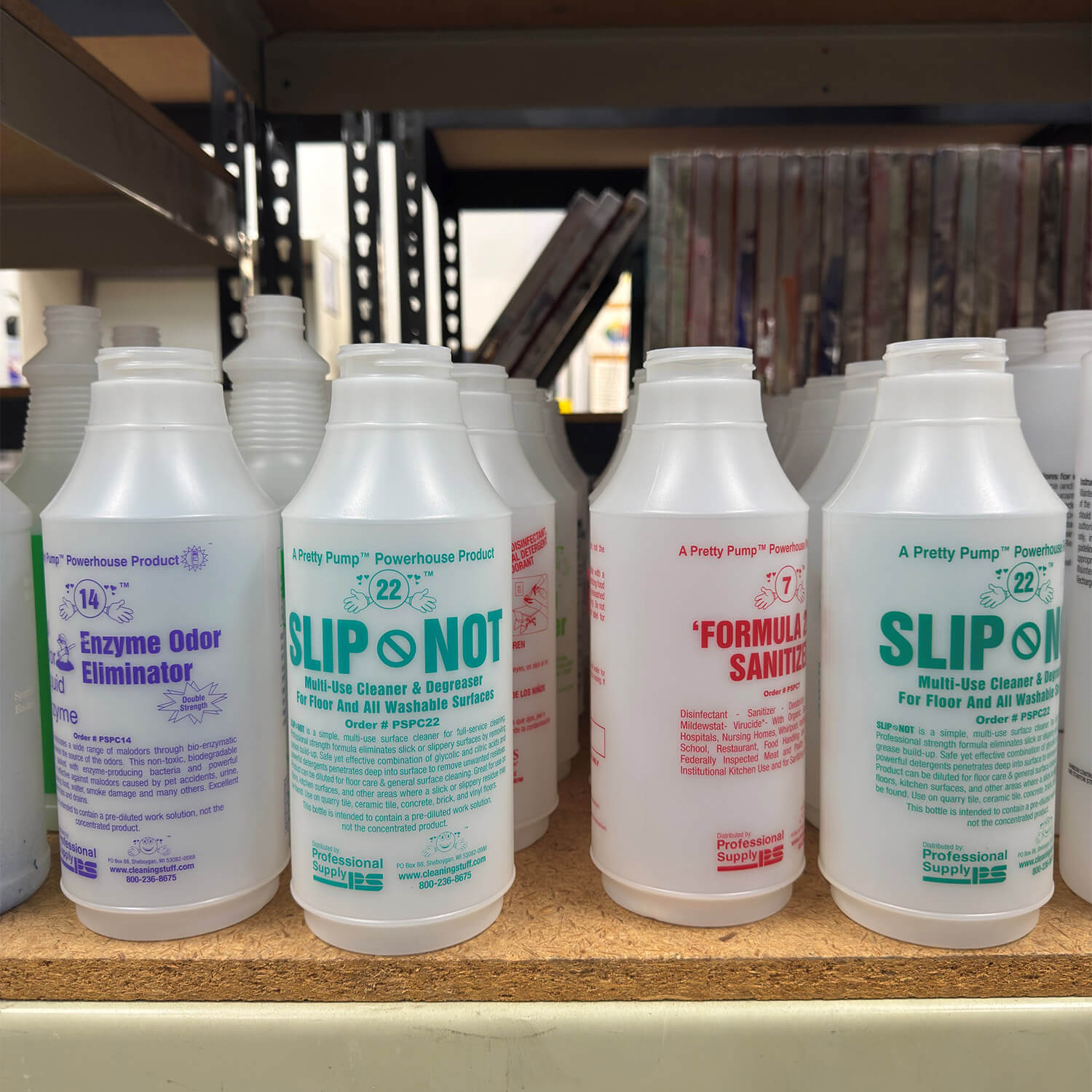 Pretty Pump cleaning solution refill bottles with single-color screen printing in purple, teal, and red
