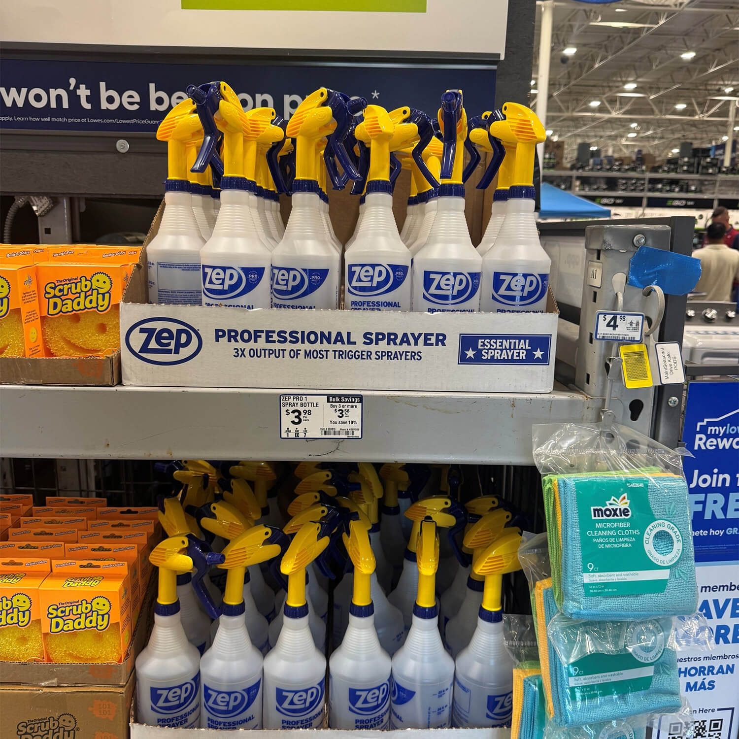 Zep Professional Sprayer bottles with screen-printed blue graphics on a retail display