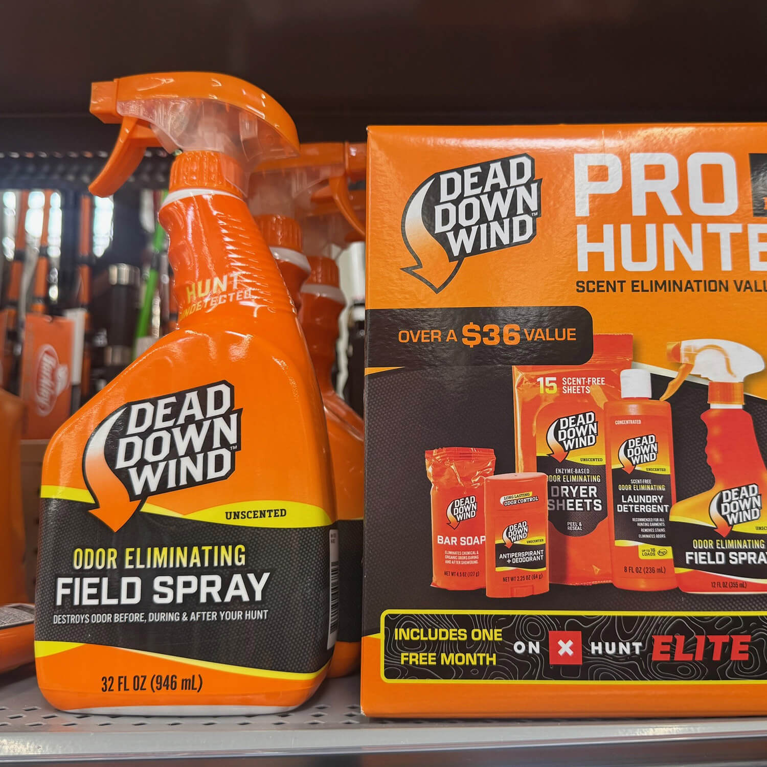 Dead Down Wind odor eliminating field spray bottles with full-body shrink sleeves on a store shelf