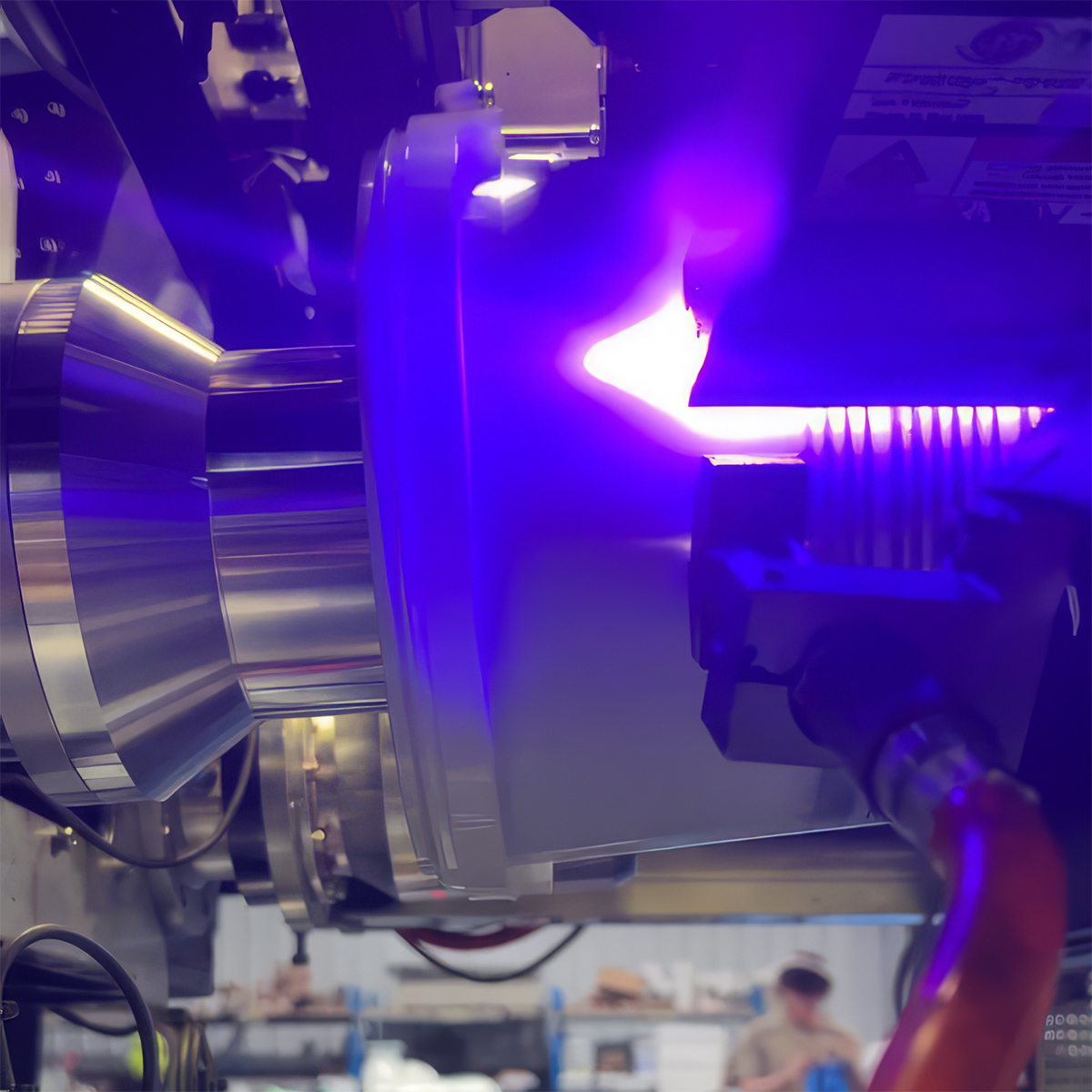 Full-color artwork being printed directly onto a plastic container