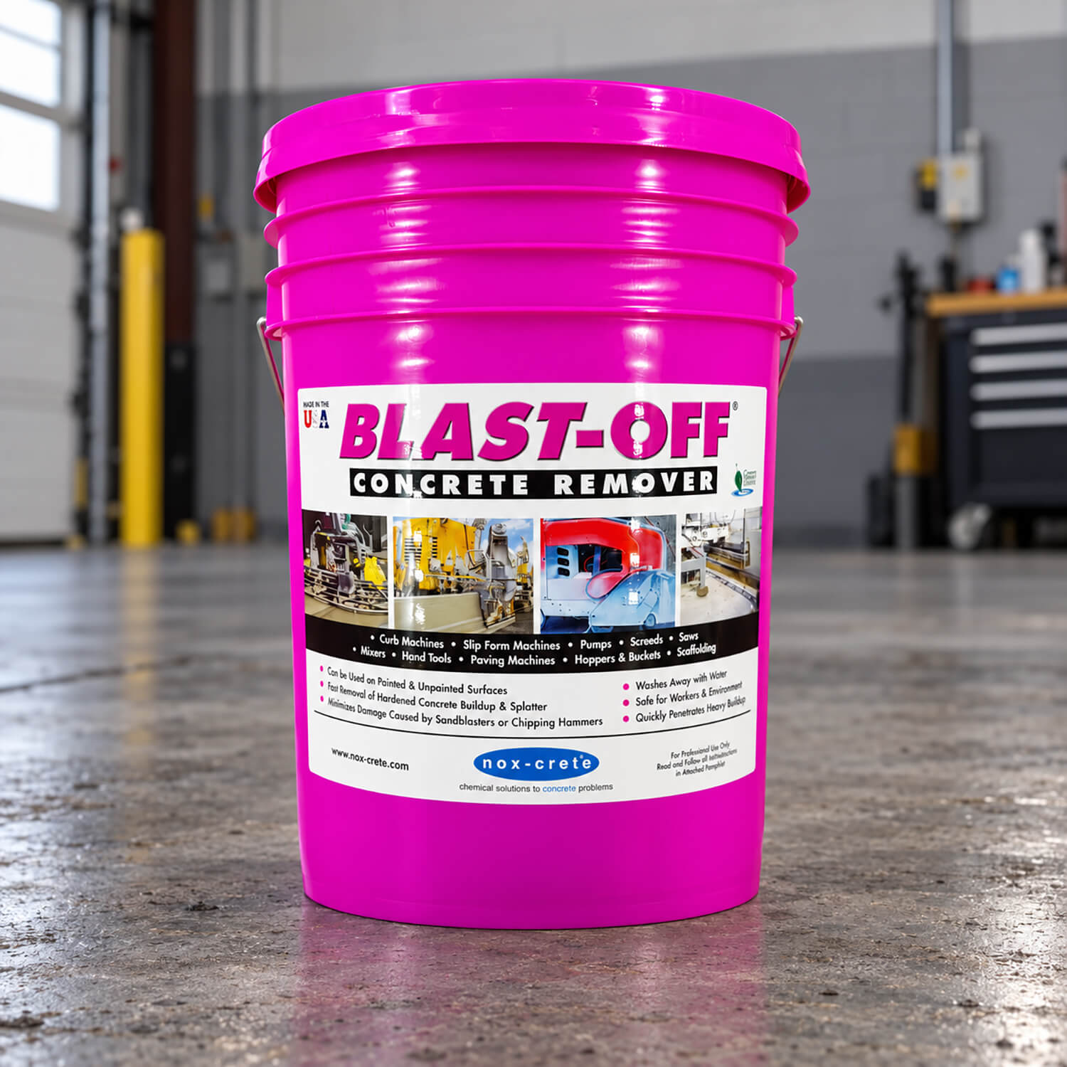 A magenta Nox-Crete Blast-Off Concrete Remover pail with a full-color label on a shop floor