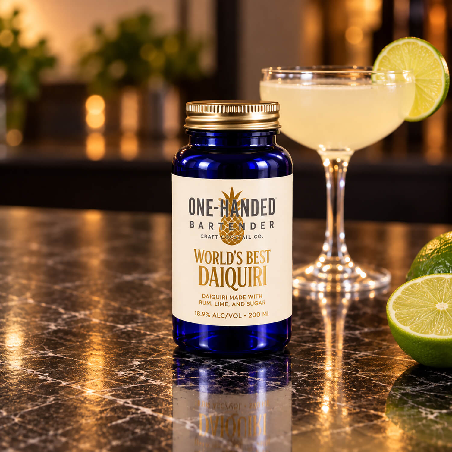 A One-Handed Bartender World’s Best Daiquiri bottle with a gold-foil pressure-sensitive label