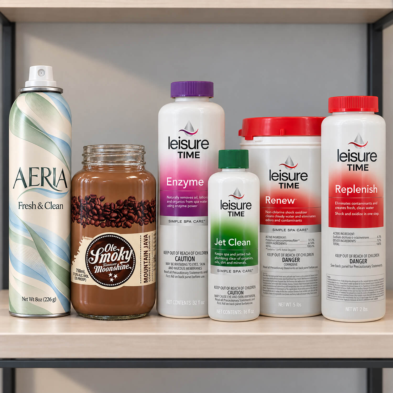 Shrink-sleeved containers on a shelf: an Aeria aerosol can, an Ole Smoky glass jar, and four Leisure Time spa care bottles and tubs