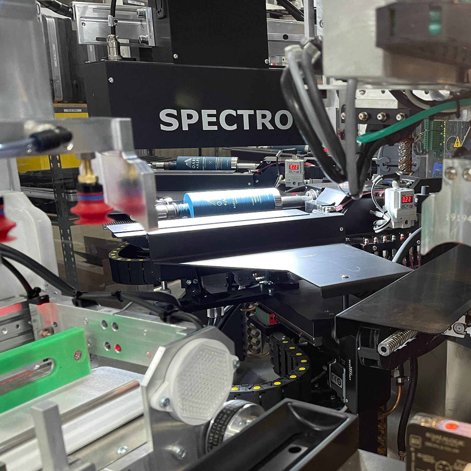 A servo-driven silk-screen printing press in action