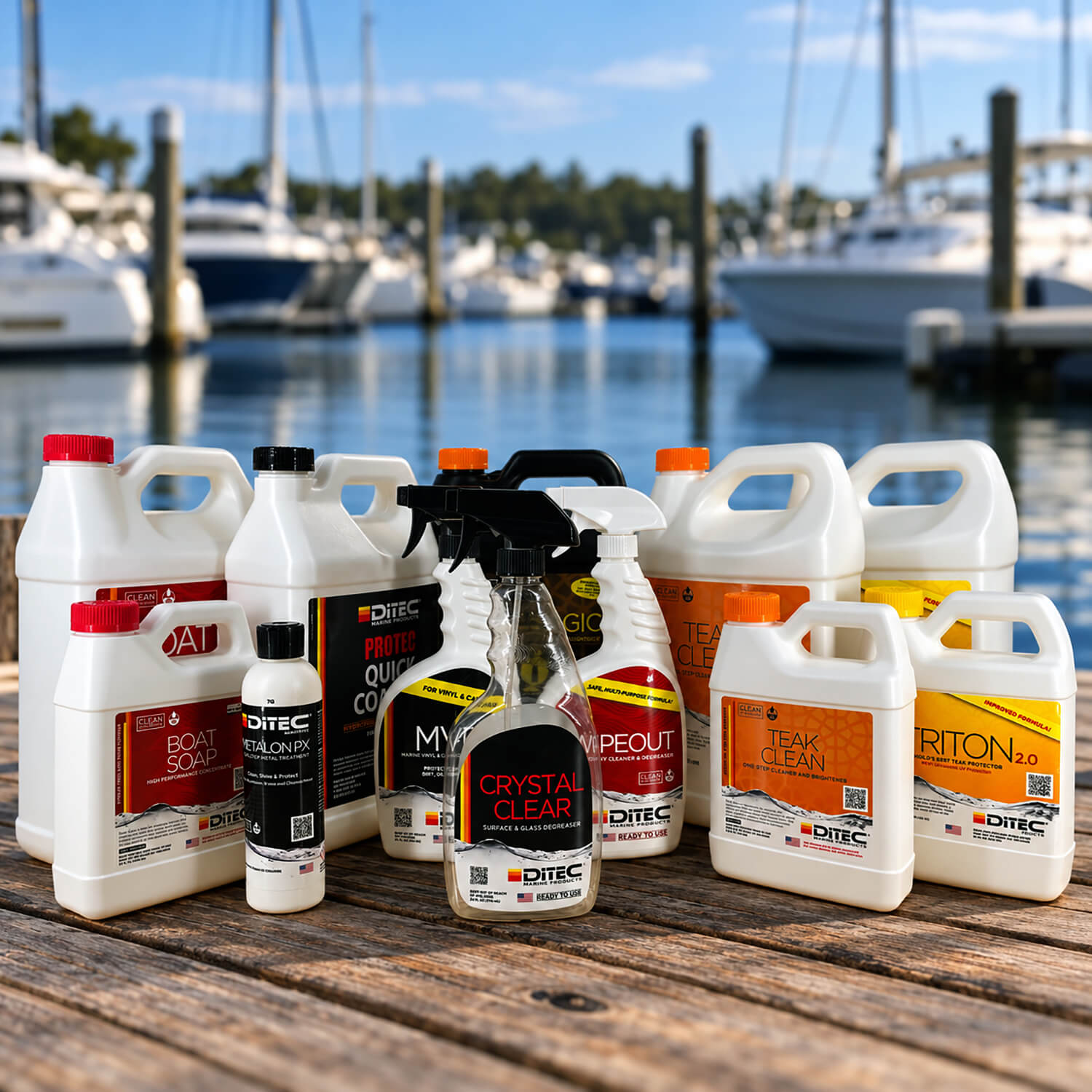 A lineup of DiTEC marine care jugs and spray bottles with bold full-color labels on a marina dock