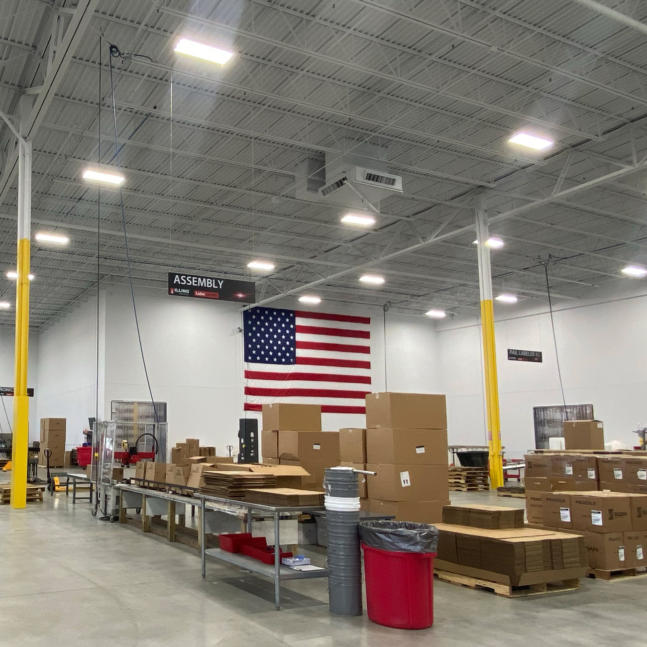 Kitting and value-added assembly line staging finished packaging for market at ILLING Packaging